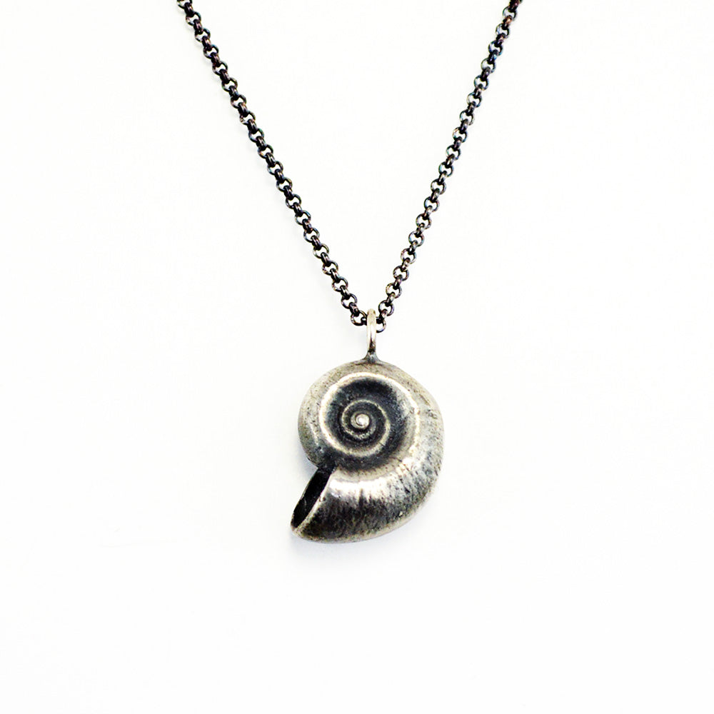 oxidized silver nautilus pendant necklace on white background