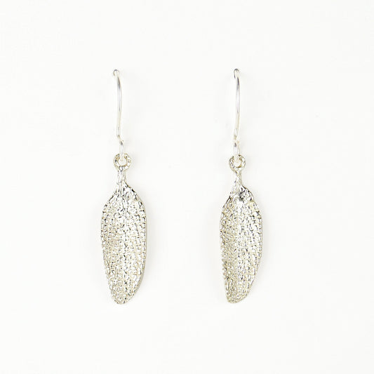 silver sage leaf earrings on plain white background. incredible detail