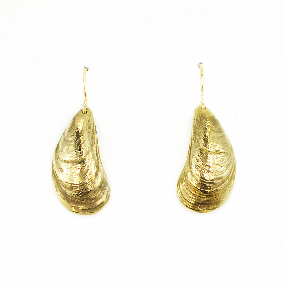 pair of golden bronze mussel shell earrings on white background