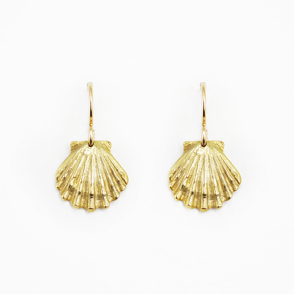 golden bronze scallop shell earrings on a white background