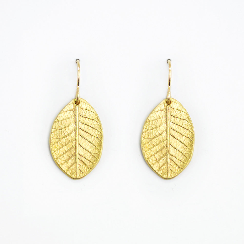 beautifully detailed golden bronze smokebush earrings on a white background