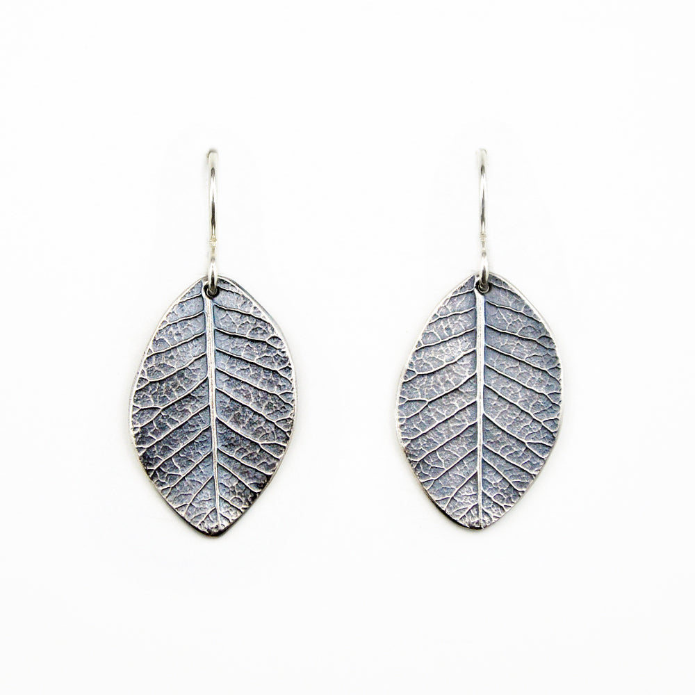beautifully detailed oxidized sterling silver smokebush earrings on a white background